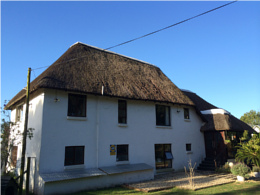 Thatch roof before converting to tiles
