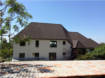 Thatch roof converted to onduvilla tiles